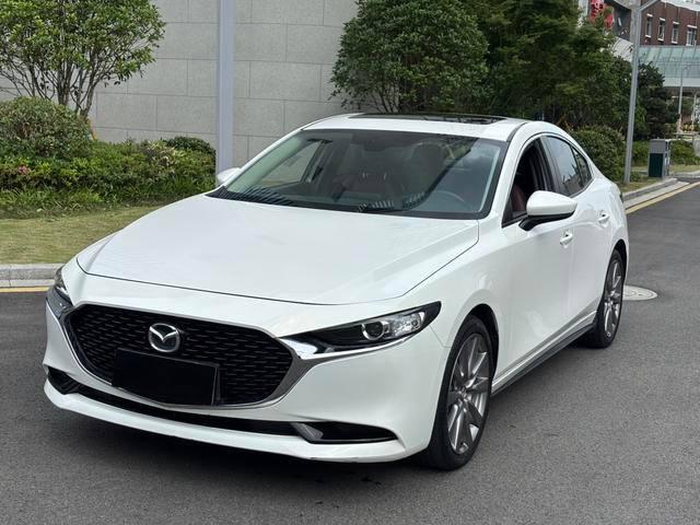 Mazda 3 Axela — фото 1